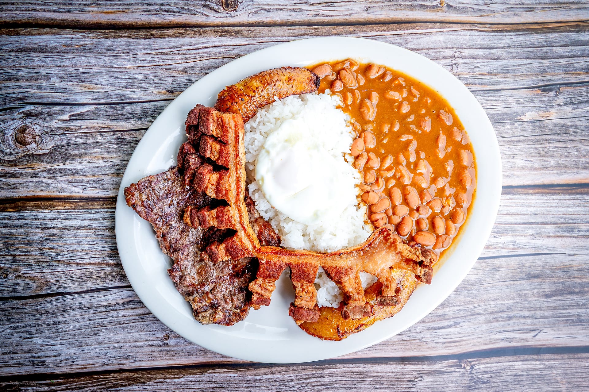 Bandeja paisa ready for pickup at Las Delicias Colombianas Hyde Park